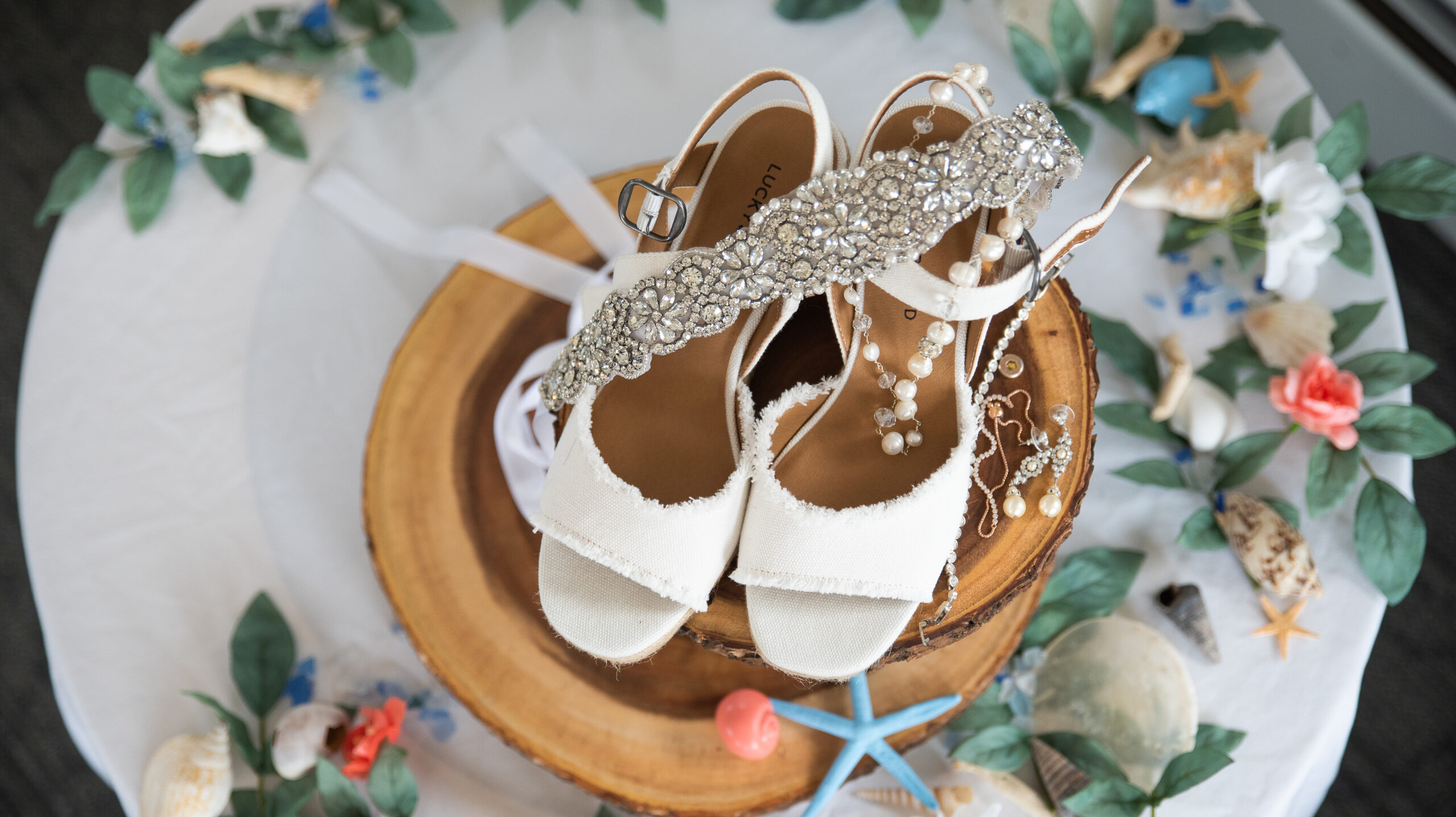 wedding details of shoes and jewelry